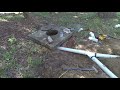 Installing drainage system and swale to solve standing water in back yard.