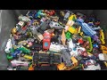 Several toy cars randomly selected and shown in hands