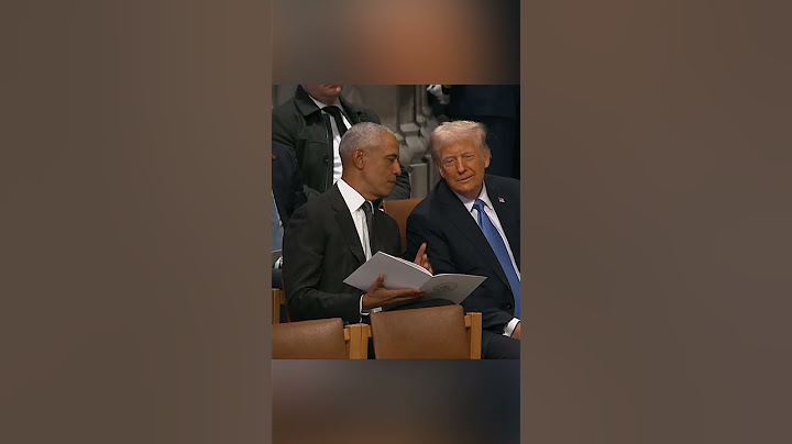 Donald Trump and Barack Obama share a laugh as they attend Jimmy Carter's national funeral