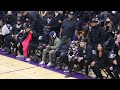 Kanye West, French Montana and Justin Laboy sit courtside at the Donda Doves Homecoming game