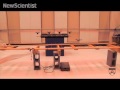 Robot helicopters perform james bond tune