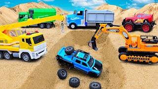 Rescue the truck from the sand pits with excavator and crane truck