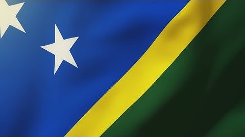 4K Solomon Islands flag waving in the wind. Looping sun rises style. Animation loop Stock video