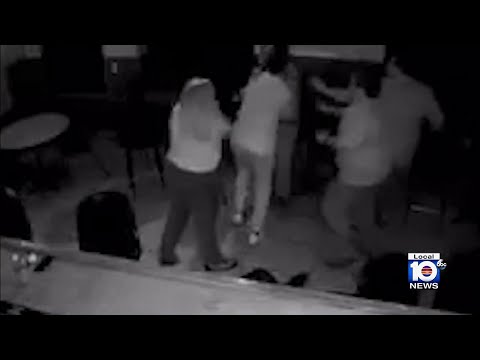 Palm Coast man caught on camera being tackled by bar patrons after putting woman in headlock, sh...