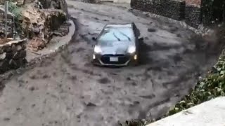 Driver Who Slid Down Street During Mudslide: ‘The Force Was Amazing’