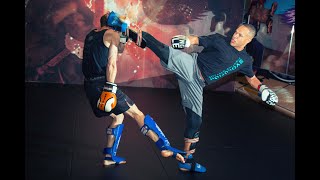 Kickboxing Sparring - How to Set up and Land Spinning Kicks with Raymond Daniels