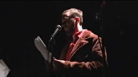 Lester Allen belts out some poesy at the Tainted C...