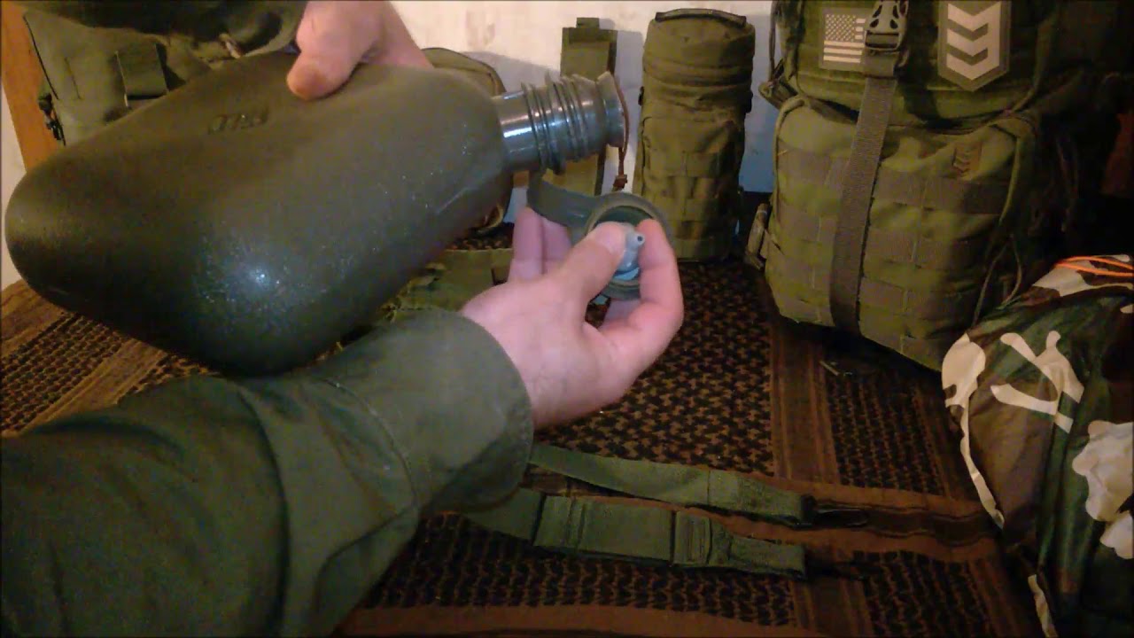 Military issue 2 quart canteen with GI issued insulated cover and M1