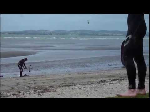 Launching and landing a Bow Kite with the aid of a Sand Anchor