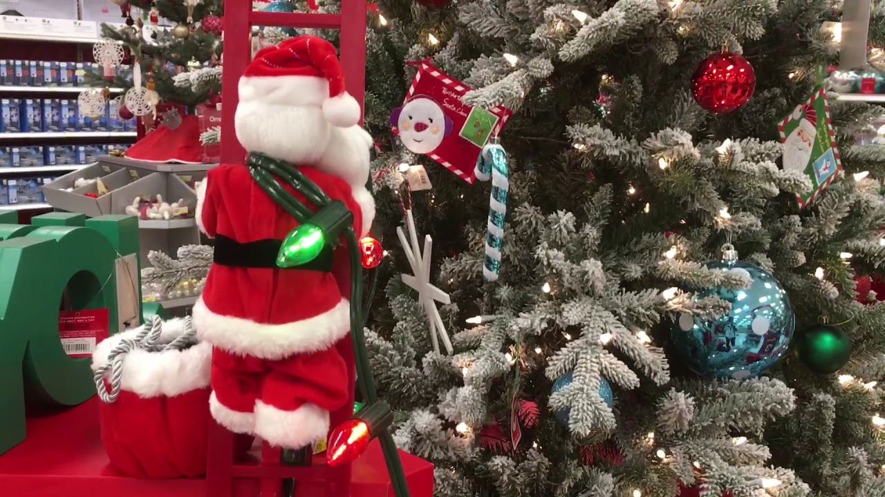 Santa Claus climbing up and down on a ladder. - YouTube