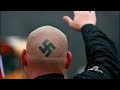The man with the swastika tattoos