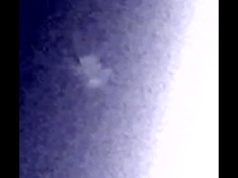 LARGE UFO FLYING INTO OR BEHIND OUR SUN!