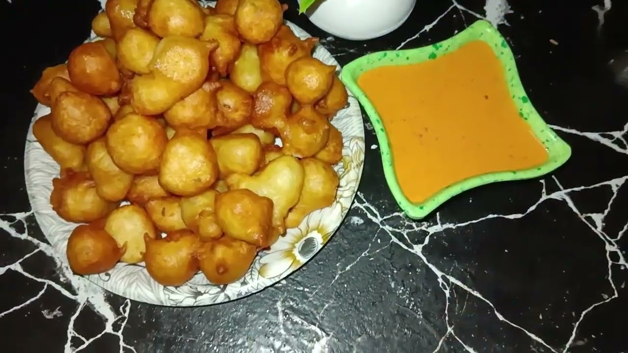 దోశలు పిండి మిగిలిపోయిందా అయితే ఇలా బండి మీద అమ్మే రుచికరమైన చిన్ని చిన్ని పునుగులు ట్రై చేయండి n