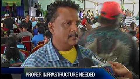 Former Caroni Workers Receive Land Leases