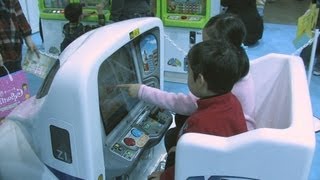 最新のゲームマシンを体感 幕張メッセで