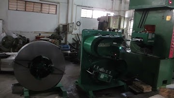 Double End Cradle with S loop straightener and high-speed gear feeder.