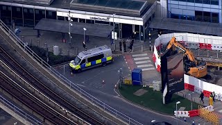 Police examine 3 explosive devices in London