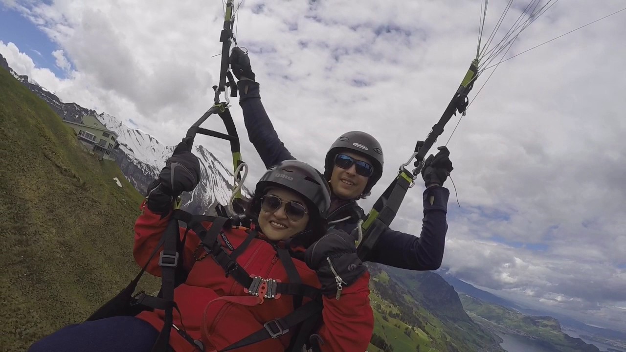 Paragliding tandem with guests from India at mount Niederbauen.