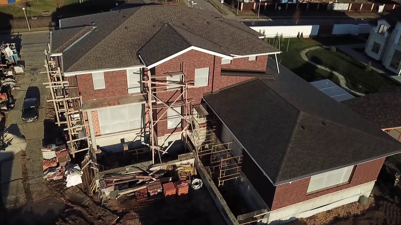 Каменный дом с облицовкой кирпичом,  1394 м2