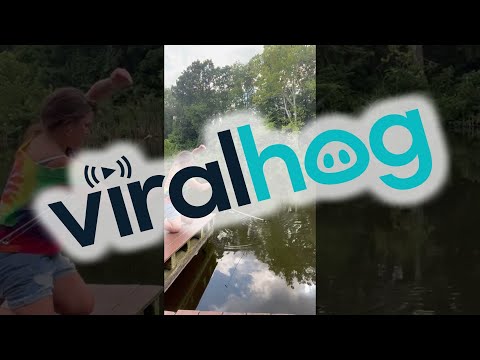 Woman Catches Catfish After It Takes Off With Her Fishing Pole || ViralHog