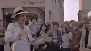 Steve Martin Playing Banjo Along Yonge Street In Toronto (1974) Wealth