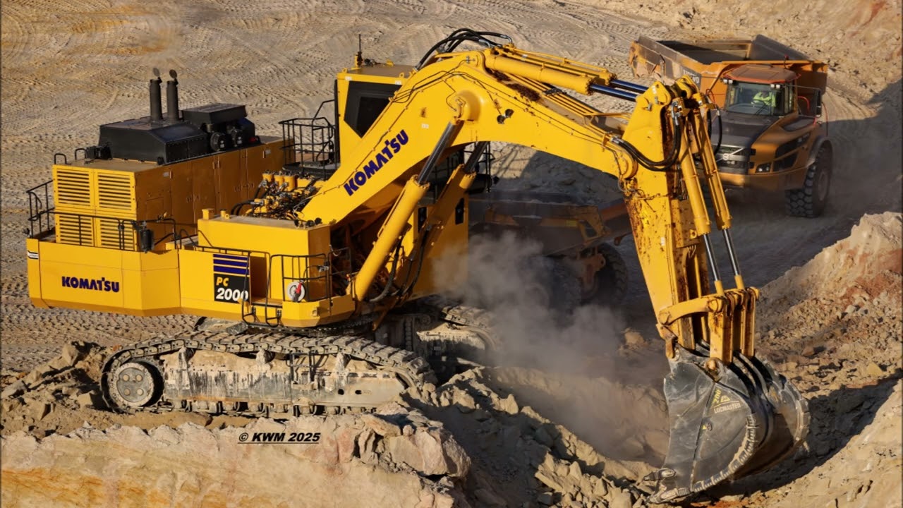 Komatsu PC2000-11 loads Volvo ADTs in germany                   