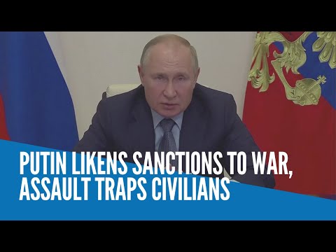 Putin likens sanctions to war, assault traps civilians