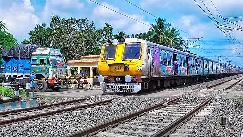 Quick Speedy Aerodynamic Colourful EMU Train Furiously Skip Between Railgate | Eastern Railways