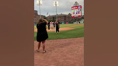 Sarah Barker sings the Star-Spangled Banner at the...