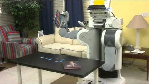 PR2 robot placing 2 books on top of each other