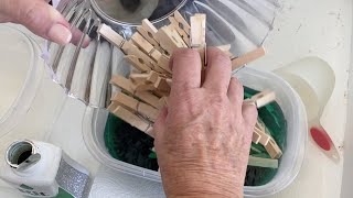 She soaks 50 clothespins in a tub of water to get this beautiful porch accent!