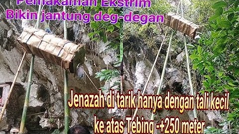 Pemakaman ekstrim di Tebing terjal Londa hanya menggunakan Tali kecil tuk menarik jenazah