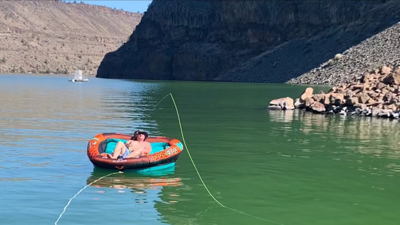 Fly Fishing BIG Lake TROUT// On GIANT Inner Tube 