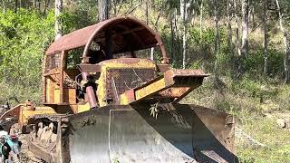 Allis Chalmers dozer pushes dirt