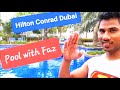 Conrad Dubai Hilton Pool and sunbathing