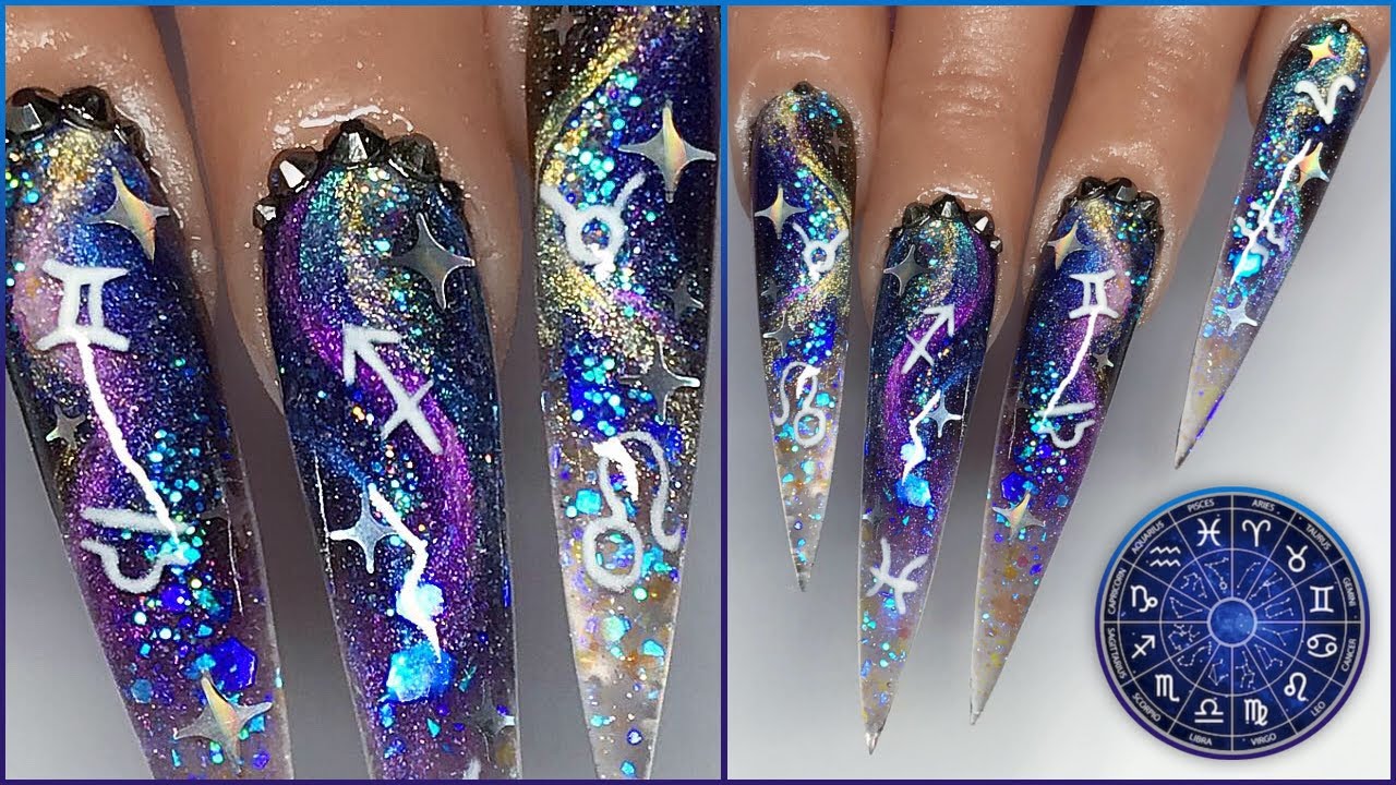 6. Galaxy Stiletto Nails: The Ultimate Nail Art Trend - wide 5