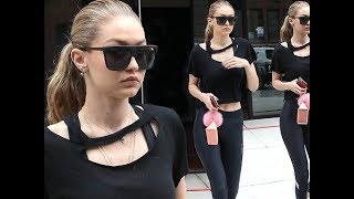 PFW Gigi Hadid flashes her cleavage