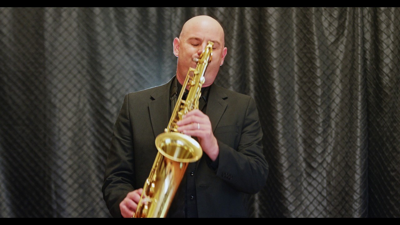 Jason performing Marry Me by Train on saxophone