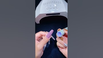 This handheld LED Nail Lamp offers convenience and hyper-fast drying for your daily manicure