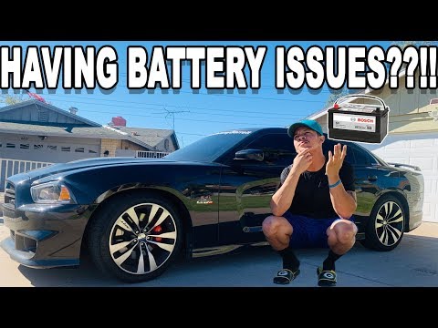 Video: Kde je baterie v nabíječce Dodge 2011?