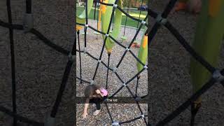 Little boy falls from top of monkey bars at playground and lands on his back