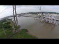 Large cranes pass under Talmadge Bridge