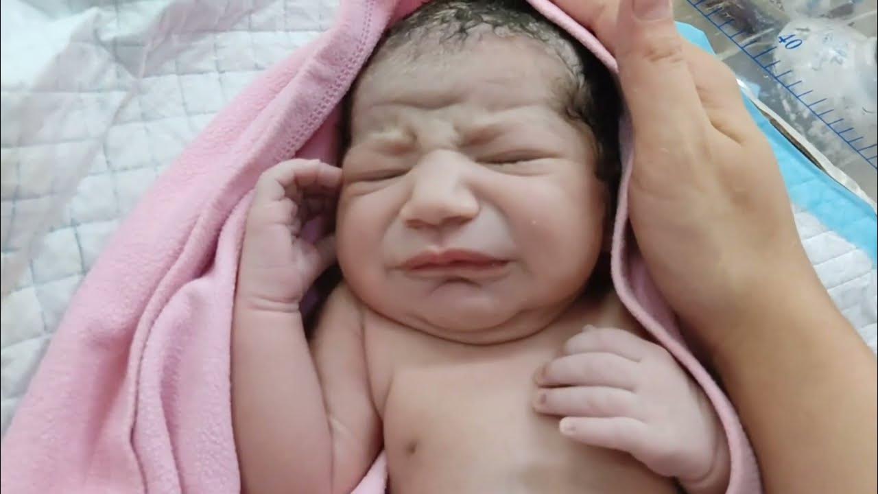 big-newborn-baby-just-after-birth-who-is-calmed-down-after-doctor-love