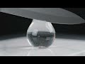 Glass Pear: A hyper realistic AI generated ASMR video shot in extreme macro perspective. A razo...