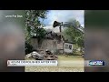 Crews fighting fire at Kansas house end up tearing it down