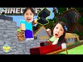 Ryan teaches mommy how to play minecraft