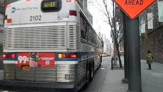 MTA Bus Company 1999 MCI 102DLW3SS #2101 on Route QM11 @ Trinity Place & Thames Street