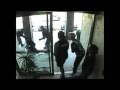 Thats a painful getaway handbag thief smashes through glass door in us