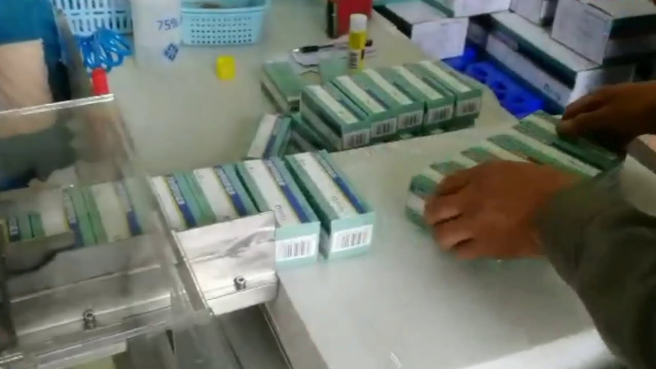 vials labeling boxing cartoning end packaging line fully automatic labeller cartoner