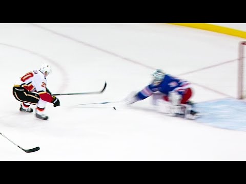 Flames’ Lazar pokes puck under Lundqvist to score first of the season